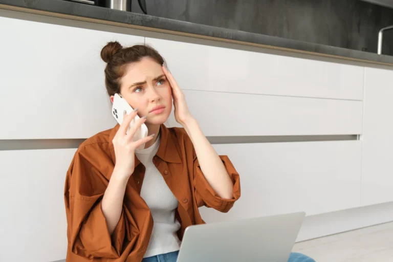 Expat waiting for a phone call after a French job interview